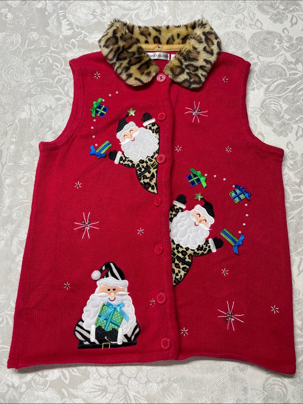 Rebecca Malone red Christmas vest Santa faux leopard print. Size M. Preowned.